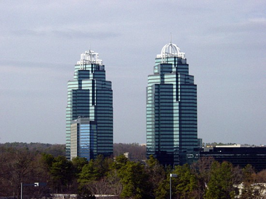 These high-rise office towers are a familiar landmark along Atlanta's I-285 beltway, known as the Perimeter. The "King and Queen" buildings express a vision of automobile-scaled architecture, their reflective-glass walls rising from the greenery of a planned development. The problem of Atlanta's traffic congestion, and the role of commuter destinations such as these, is not immediately visible from this idyllic perspective.